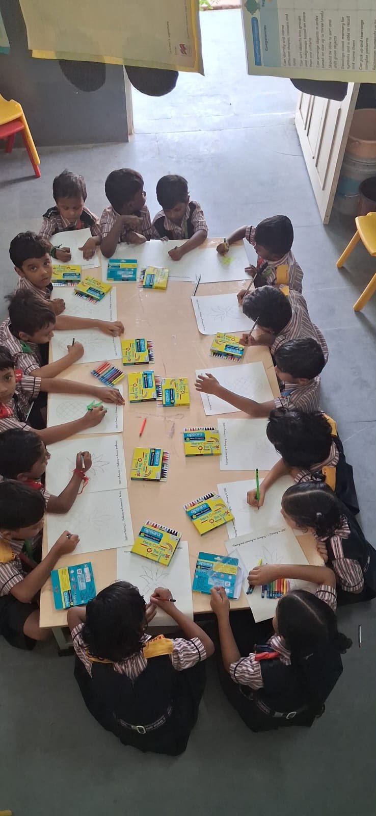 Primary Students Engaging in Art and Coloring Activity